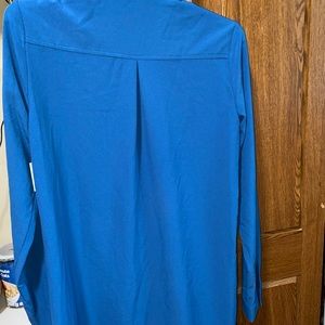 I’m selling this blue dress never worn and it’s from JustFab.